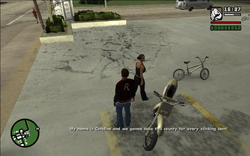 She introduces herself as Catalina and says that she and Carl are going to rob their way through Red County.