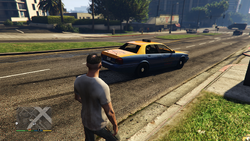 Taxi pulling up after calling Downtown Cab Co.