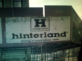 Hinterland advertisement showing its logo and motto.