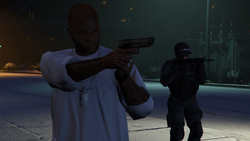 Escorting King Tiny to the getaway vehicle while fighting the police.