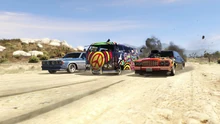 LosSantosDrugWars-GTAOe-TrailerScreenshots-TulipSurferTahoma.png (5.3 MB) Players attacking a Surfer Custom Hippy delivery van, in a Tulip M-100 and Tahoma Coupe being chased by Hippies in Weevils.