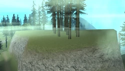 The hill on which the structures were originally located.