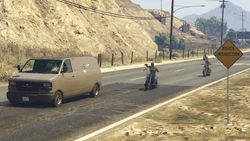 The Lost MC chasing and damaging the van.