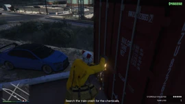 Cutting open a shipping container in a railroad well car during  in GTA Online.