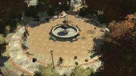 A fountain in the middle of the park.