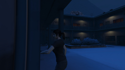 Entering the motel room.
