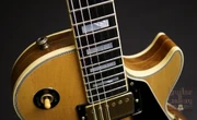 A 1976 Gibson Les Paul Custom, showing off binding on the front and back edges of the guitar