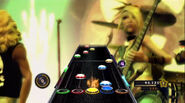 Graphics of HOPO notes in Guitar Hero 5, Band Hero, and Guitar Hero: Warriors of Rock.