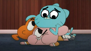 Gumball is training to wrestle Dan.