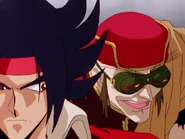 Kyral appears behind Domon