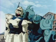 Using the disabled Gundam Ez8 as a shield (Episode 10)