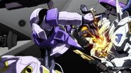 Hitting Gundam Bael with Drill Knee's broken drill (McGillis Fareed)