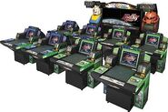 Arcade setup, with main screen and eight satellite consoles.