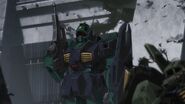 Flashback of a Nemo standing outside the Augusta Newtype Lab with a disabled RMS-106 Hizack nearby