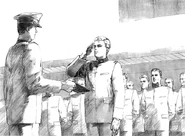 Brian Aeno hands Eton Heathrow his diploma.