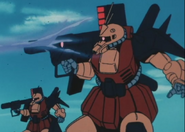 Rommel Corp's Desert Zakus in action, firing 290mm rocket launchers (from Gundam ZZ TV series)