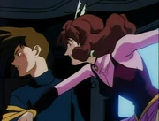 Catherine punches Trowa.