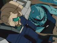 Karen Joshua's Gundam Ground Type "GM Head" being ambushed by MS-07B-3 Gouf Custom (right)