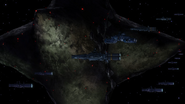 Confeito being escorted by Federation ships towards Granada (Falling on the Moon)
