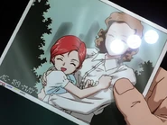 Leia Barton holding her infant daughter Mariemaia, May AC 189, from Gundam Wing: Endless Waltz