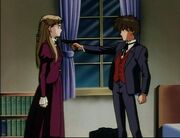 Heero points a gun at Relena.