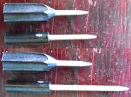 12-Gauge flechette with fluted sabot.