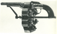 Transitional revolver incorporating Enouy's patent. This example has eight cylinders.