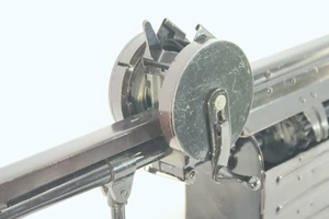 The large flywheels on the top of the AG-026.