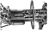 Close-up of the rammer putting a fresh round into place