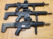 Three airsoft models of the 2012-spec Senshin Keiryōka Shōjū version of the Howa Type 89.
