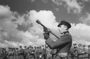 A German officer aims a Sturmpistole loaded with a Wurfkörper 358 LP, Russia, 1943.