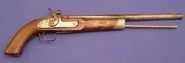 An earlier percussion pistol.