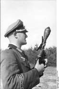 A German officer holds a Sturmpistole loaded with a Panzerwurfkörper 42 LP, Russia, 1943.
