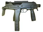 SMG TMP.jpg (53 KB) TMP with a stock and a rail for optics on top of the receiver