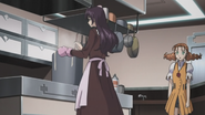 Yukiko prepares a meal for when the others have finished fighting