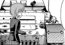 Miho in front of her Panzer II before the contest against Erika.