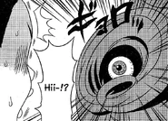 HosomiEyeballHairs.jpg (285 KB) Fake eyeball in Hosomi's hair