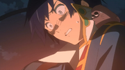 Simon watches Kamina City on fire