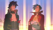 Kamina stands with Simon