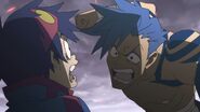Kamina about to punch Simon