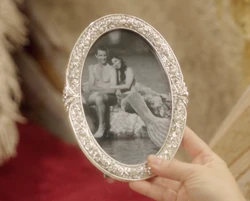 A photograph of Rita as a mermaid alongside her human fiancé, Harry.