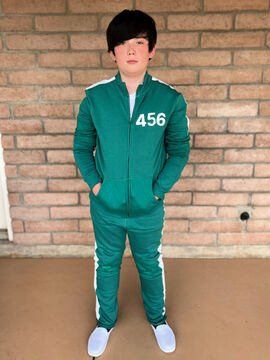 Become a Squid Game player in this Player 456 Track Suit costume –