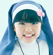 Momoka Yamada as the naive and gluttonous nun Maria