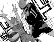 Hinata successfully blocks Osamu.