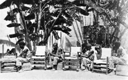 Men making chairs from scratch. Back in the 1920s in Haiti, accused criminals were put into forced labor, from building roads, to doing other constructive things like making furniture.