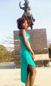 A striking portrait at Point Tambour, downtown Saint-Marc, where contemporary elegance meets one of the city’s most iconic landmarks.