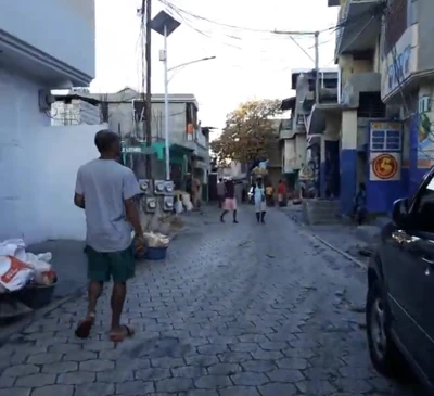 Morning activity along one of Christ-Roi’s narrow interior streets.
