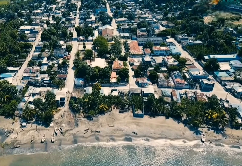 Aerial view of Tiburon’s beachfront district, where fishing boats line the shore and the town’s grid unfolds toward the hills