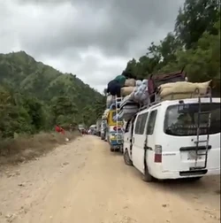 Traffic backed up along an unpaved stretch of the  in Grand-Gilles, during a disruption in mountain terrain.