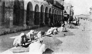 1921. Haitian coffee was a big export. Here are some workers sifting coffee.